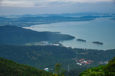 High angle view of townscape by sea