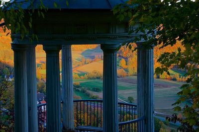 Gazebo in park against sky during autumn