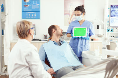 Doctor examining patient at hospital