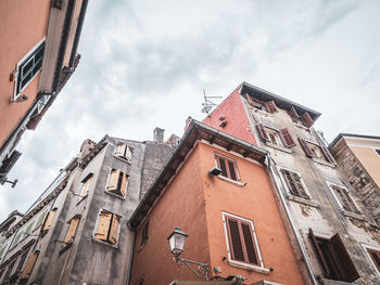 Low angle view of old town buildings against sky