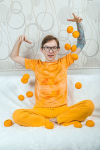 Guy with tangerines