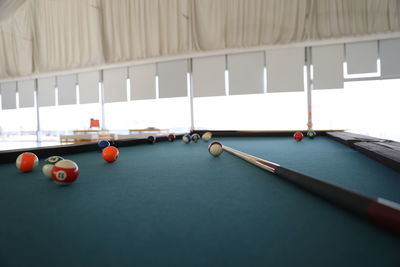 Pool table in a middle of a game