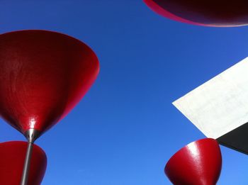 Low angle view of red wall