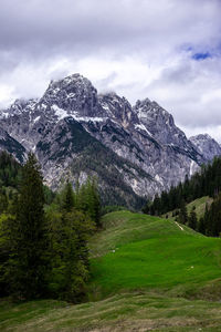 Scenic view of snowcapped mountains against sky