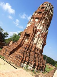 Low angle view of old ruin building against sky