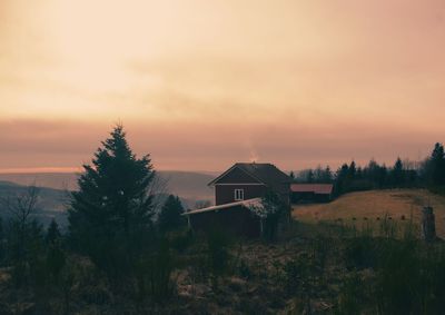 Scenic view of mountains against sky during sunset