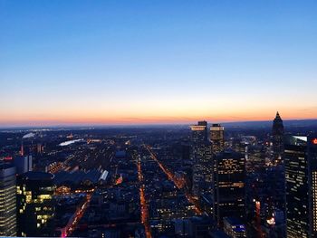 High angle view of city buildings during sunset