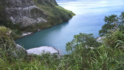 High angle view of water flowing through rocks