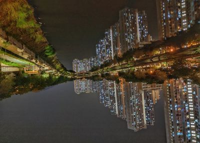 Illuminated buildings in city at night