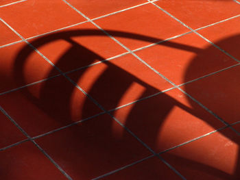 High angle view of shadow on floor