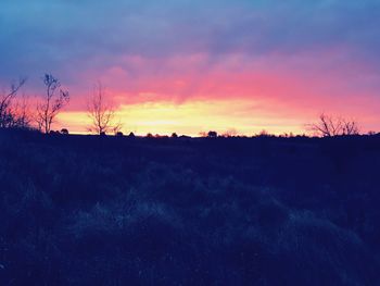 Scenic view of dramatic sky during sunset