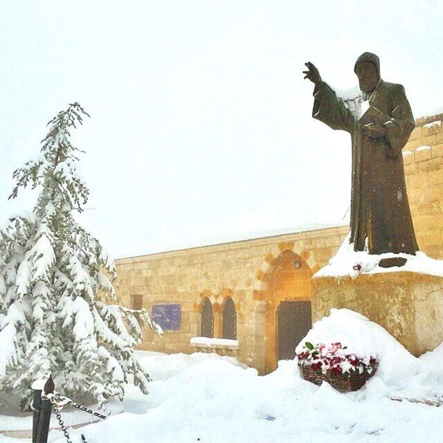 snow, winter, cold temperature, season, clear sky, statue, human representation, weather, sculpture, art and craft, art, religion, white color, built structure, architecture, creativity, copy space, covering