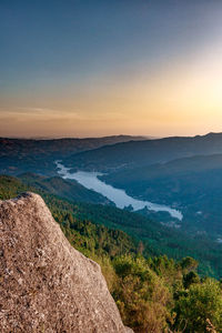 Scenic view of landscape against sky during sunset