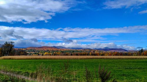 Scenic view of landscape against cloudy sky