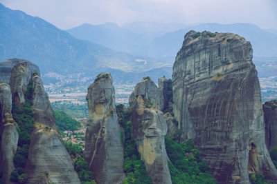 Panoramic view of landscape with mountain range in background