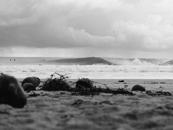 Scenic view of sea against cloudy sky