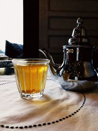 Close-up of tea in glass on table