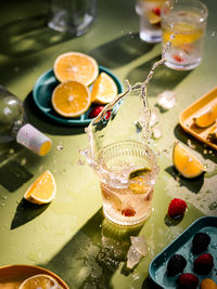 High angle view of infused water in transparant glass