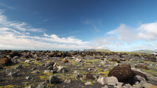 Rocks on land against sky