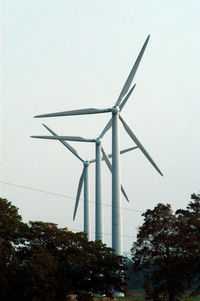 Low angle view of windmill against clear sky