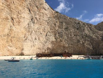 Scenic view of sea against mountain