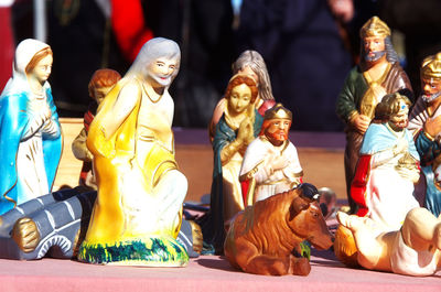Figurines of nativity scene on table