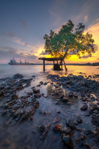 Scenic view of sea against sky during sunset