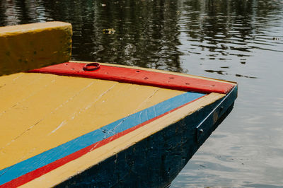 High angle view of boat moored in lake