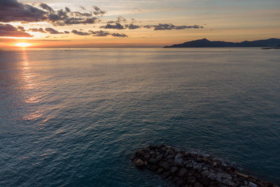 Scenic view of sea against sky during sunset, aerial view, drone photography