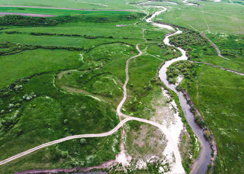 High angle view of river amidst land