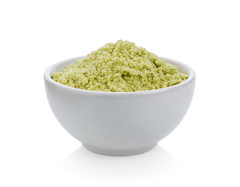 High angle view of rice in bowl against white background