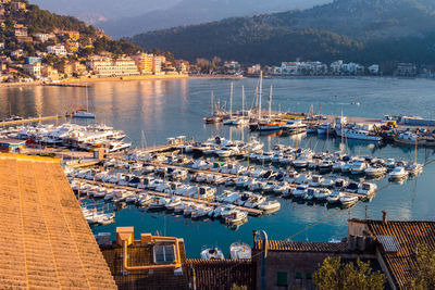 High angle view of boats moored at harbor