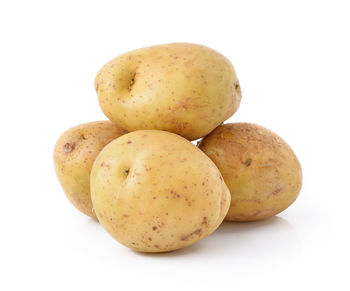 Close-up of lemons against white background