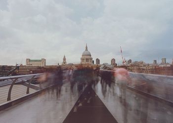 City at waterfront against sky