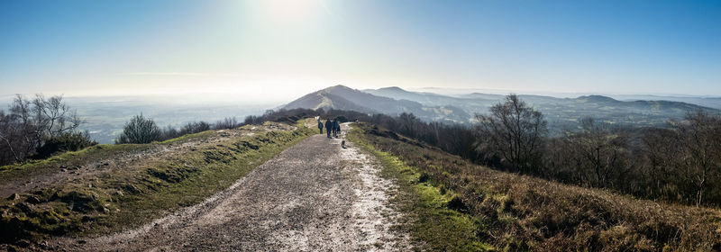 Panoramic view of road amidst mountains against sky