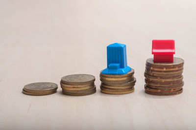 Stack of objects on table against white background