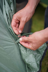 Setting up a tent for camping