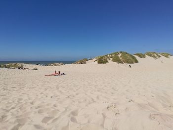 Tourists on beach