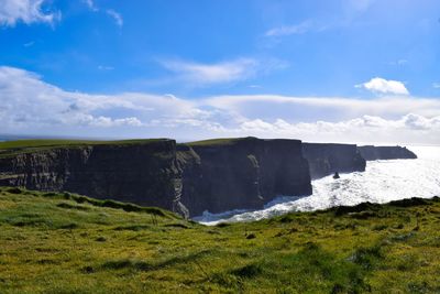 Scenic view of land against sky