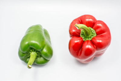 Close-up of bell peppers against white background