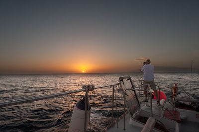 Scenic view of sea at sunset