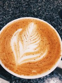 High angle view of cappuccino on coffee