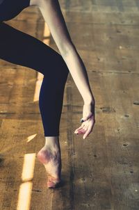 Low section of dancer on floor