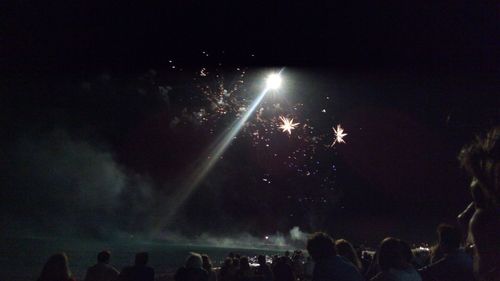 Firework display at night