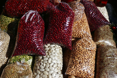 High angle view of various legumes at market stall