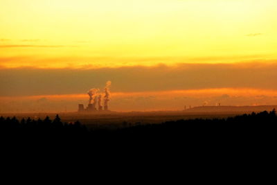 Scenic view of silhouette against sky during sunset