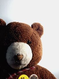 Close-up of stuffed toy against white background