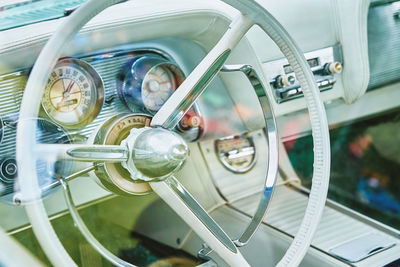 Retro car dashboard with srteering wheel