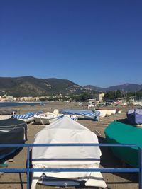 View of mountain range against clear blue sky