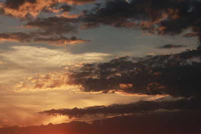 Low angle view of clouds in sky during sunset